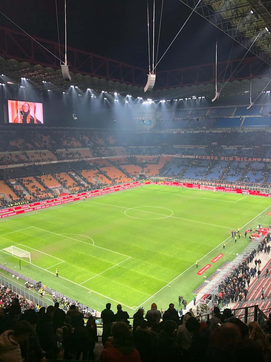 people watching football game on stadium