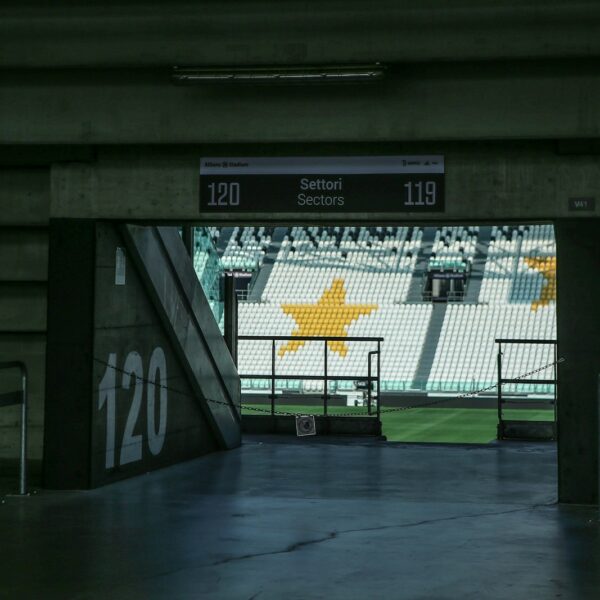 a view of a stadium from inside a tunnel